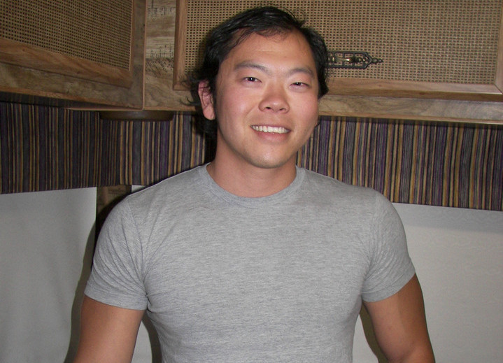 Cute Asian guy in the kitchen