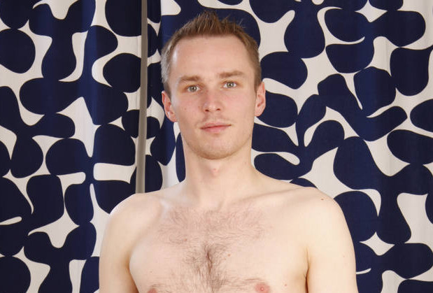 Amateur model shows his hairy chest