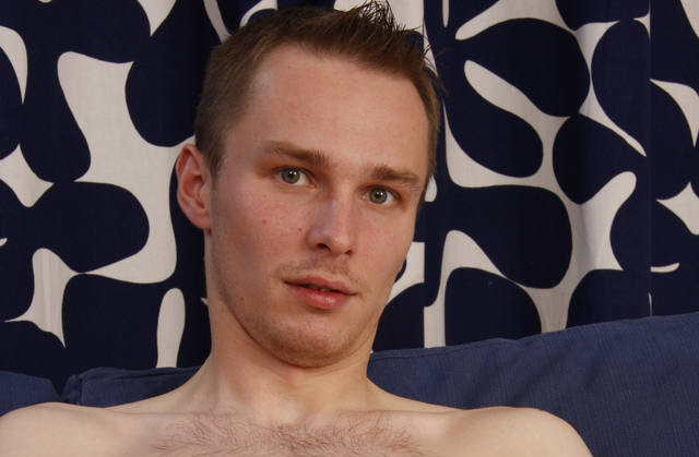 Amateur model shows his erect cock