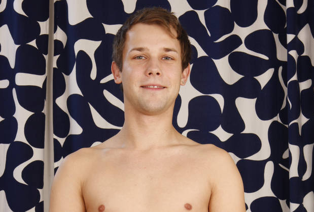 Good looking camboy unzipping his pants