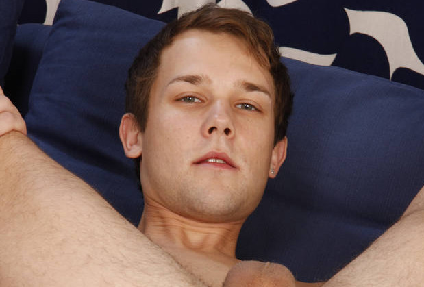 Naughty camboy spreading his legs wide